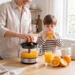 Exprimidor eléctrico de cítricos y naranjas Bestron, incluye 2 conos exprimidores y tapa aromática. - Imagen 3